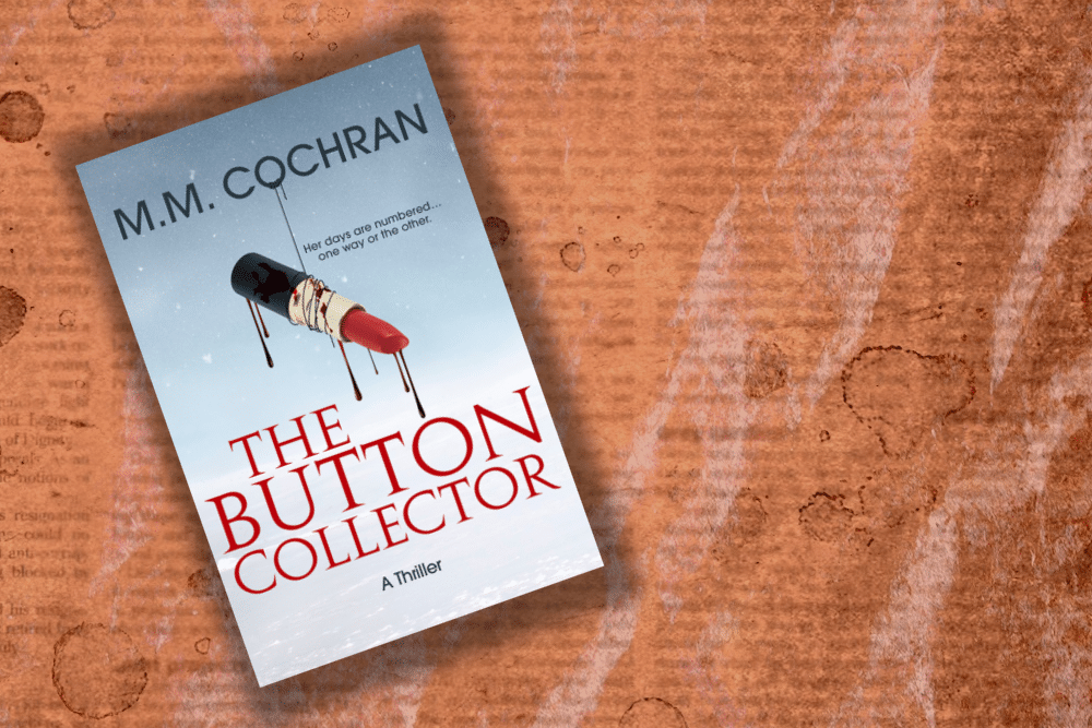 The book The Button Collector on an old bloodstained newspaper.