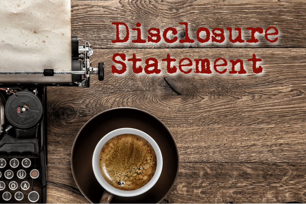 typewriter with coffee and the words disclosure statement